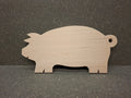 Handgefertigte Servierplatte und Vesperbrett in Schweinchenform aus massivem Buchenholz.