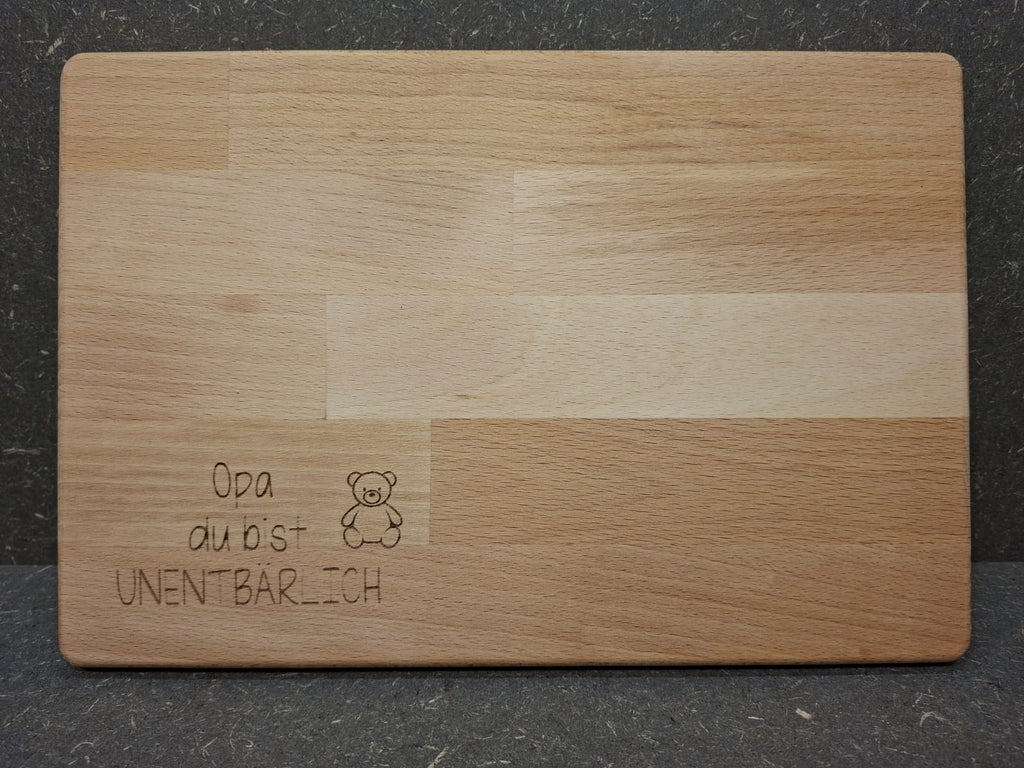 Handgefertigtes Schneidebrett aus Buchenleimholz mit individueller Gravur oder Firmenlogo.